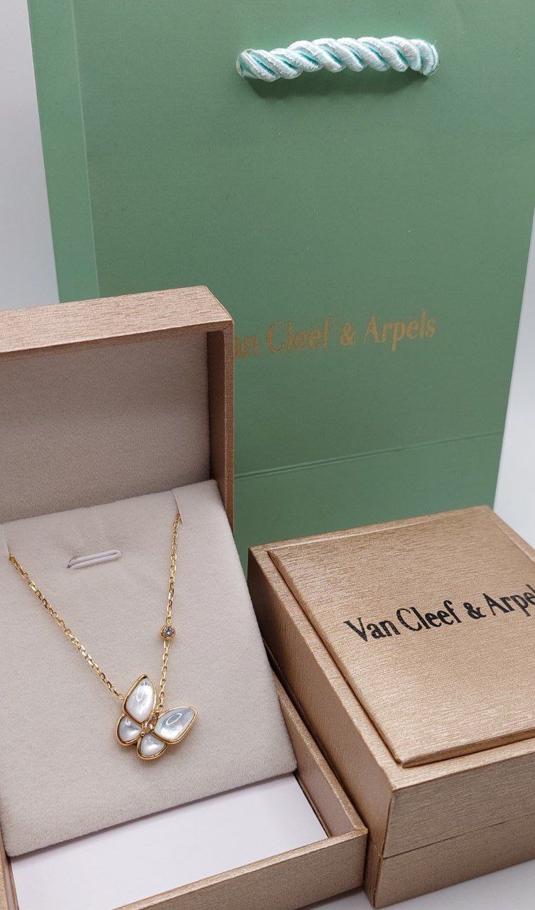 Collier acier doré Van Cleef & Arpels papillon