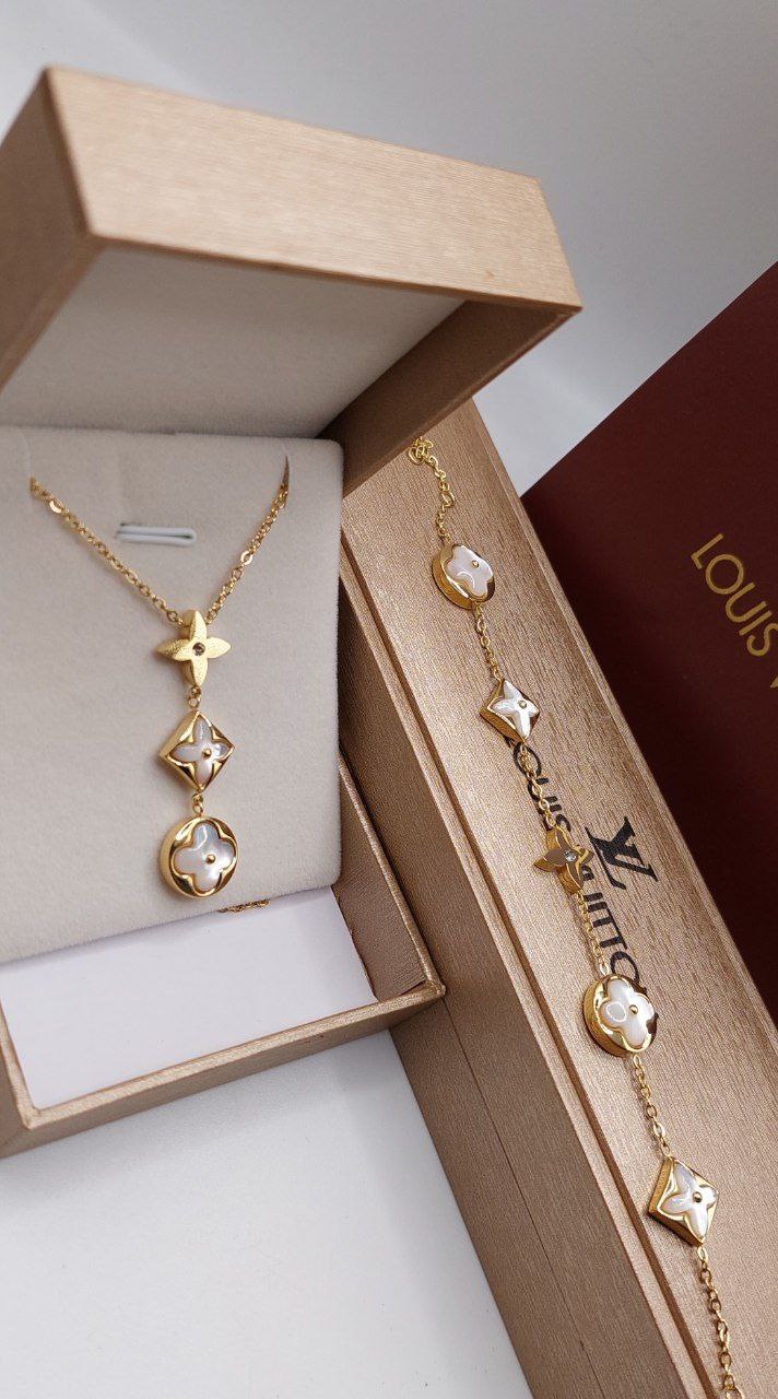 Ensemble femme acier doré LOUIS VUITTON Collier & Gourmet