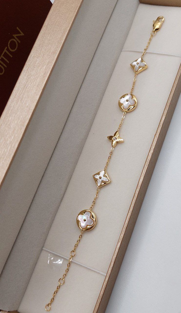 Ensemble femme acier doré LOUIS VUITTON Collier & Gourmet